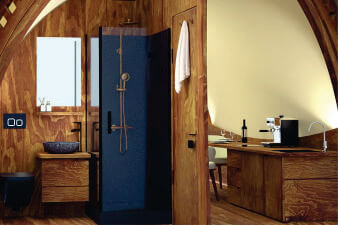 bathroom interior with wooden wall at lion Sands Masai Mara Lodge on Budget Masai Mara hotels