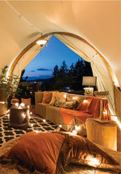 Luxury Lion Sands Masai Mara tent with sofa and furniture at luxury Masai Mara budget camp Lion Sands Masai Lodge